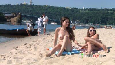 Wicked young nudist enjoys being topless at the beach - hclips.com