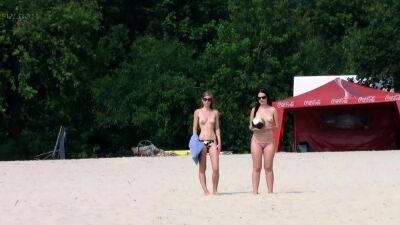 Dashing young nudist chicks have fun at the beach - drtuber.com
