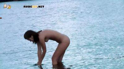 Playful Young Nudist With Nice Body Is Having Fun The Beach - hclips.com